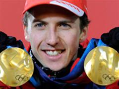 Simon Ammann mit seinen Medaillen.