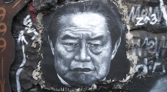 Graffiti des Paten: Zhou Yongkang, einstiger Chef des Geheimdienstes von China, ist zu lebenslänglich verurteilt worden.